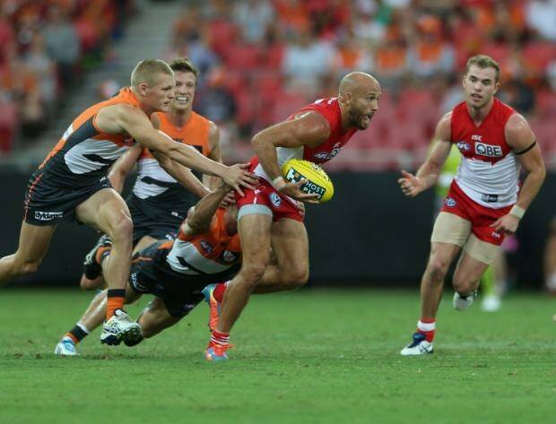 Jarrad McVeigh makes a break during the game against the Greater Western Sydney Giants. Photo: Anthony Johnson