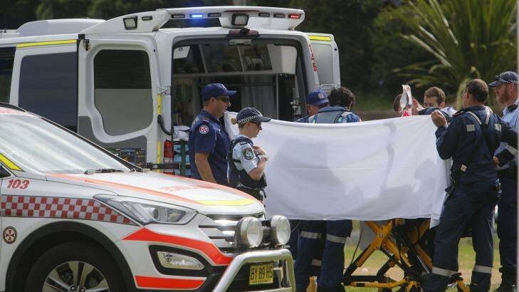 The toddler is treated by emergency services before being taken to hospital. Photo: Adam McLean