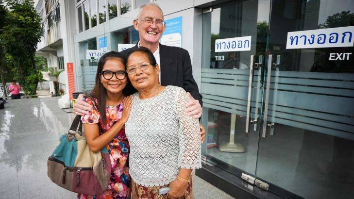 Alan Morison and Chutima Sidasathian with Chutima's mother after their acquittal in Phuket. Photo: Dan Miles