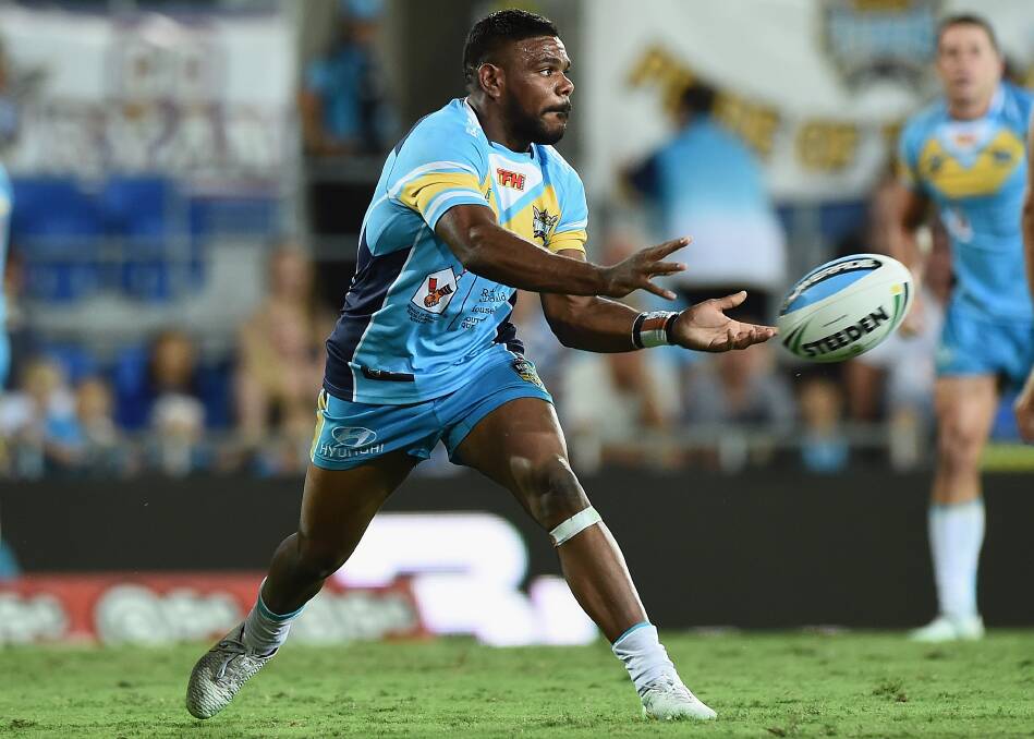 BACK FOR MORE: Titans hooker Kierran Moseley will play just his third NRL game this Saturday when he takes to the Carrington Park turf. Photo: GETTY IMAGES 	031215moseley