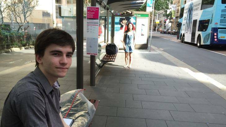 Cody Love, of Surry Hills, waits at Wynyard bus stop. He found changes to Syndey's bus routes confusing.  Photo: Anna Patty