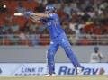 Mumbai Indians' Tim David in action during his useful seven-ball cameo against the Punjab Kings. (AP PHOTO)