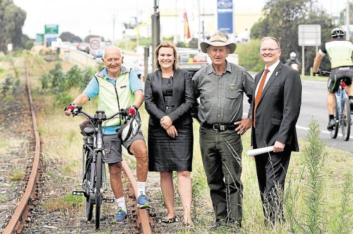 PROMISING: With Keith Price, from Safer Roads for Cyclists, are Burnie Mayor Anita Dow and (second from right) Waratah/Wynyard Mayor Robby Walsh and Braddon MHR Roger Jaensch. Picture: Stuart Wilson.