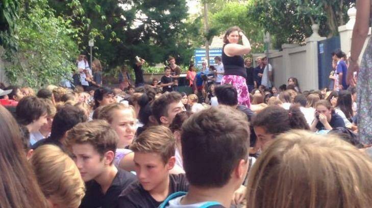 School students at Mosman High School have been evacuated to the lane way behind the school.  Photo: Supplied
