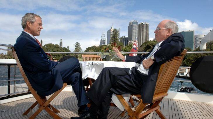 President George W Bush chats with Prime Minister John Howard in Sydney for APEC 2007. Photo: David Foote