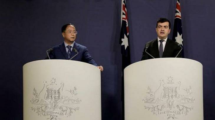 Yuhu Group chief executive Huang Xiangmo and Sam Dastyari at a press conference for the Chinese community in Sydney in June. Photo: Supplied