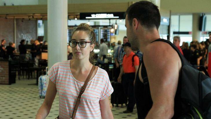 Tigerair passengers arrived back in Brisbane Airport on a Virgin Australia flight on Tuesday morning. Michael and Kate Leonard were flying back from their honeymoon. Photo: Jorge Branco