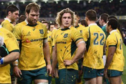 'It's news that you never want to wake up to' ... Wallabies captain Michael Hooper, centre, on the loss of Phillip Hughes. Photo: Ian Walton/Getty Images