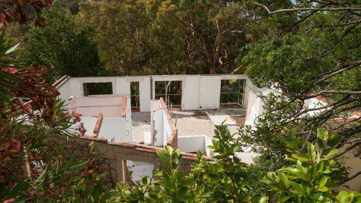 The partially demolished Mosman home of the Guvens, owned by Savas' wife Jade. Photo: James Brickwood