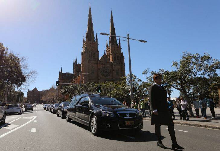 The hearse of John Johnson leaves at the end of the State Funeral for The Honourable John Richard Johnson at St Mary's Cathedral on August 18, 2017 in Sydney, Australia.  (Photo by Daniel Munoz/Fairfax Media)