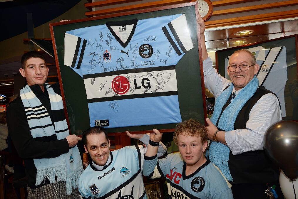 SHARKS?ARE?COMING:?Bathurst RSL Club staff members Symon Craig and Steven Bell, with Isaac Wester and Phil Wohlgemuth, are looking forward to meeting the Cronulla Sharks at the club this week. Photo:?PHILL?MURRAY	 072214psharks