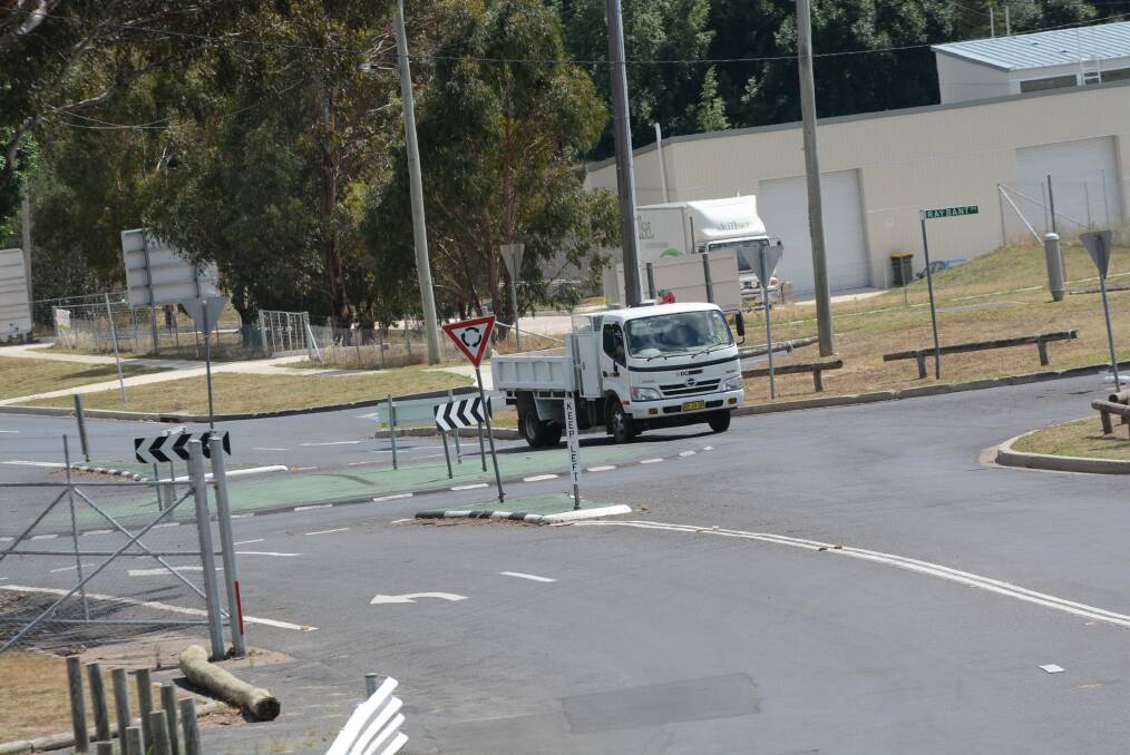 BETTER FLOW: Work will soon start on replacing this small roundabout at the entrance to Mount Panorama with a much larger, two-lane roundabout to assist with traffic flow to and from the circuit. 	120514pround