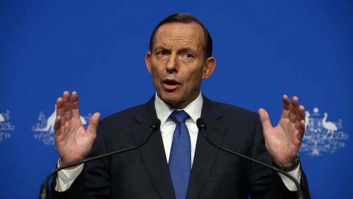 Prime Minister Tony Abbott says he is taking advice on whether the downing of flight MH17 would be classified as a terrorist act. Photo: Alex Ellinghausen