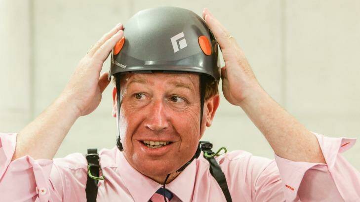 Safety first: Deputy Premier and Arts Minister Troy Grant prepares to ride the flying fox at Barangaroo.  Photo: Dallas Kilponen