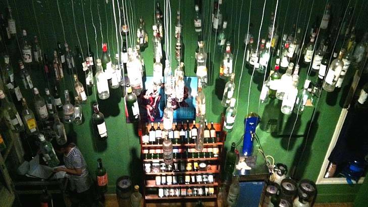 Dangling glass bottles at Bar Betta. Photo: Vegan Beats/Google