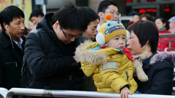 It's easier to go home for Chinese New Year if you're bringing your family along. Photo: Liu Sanghee