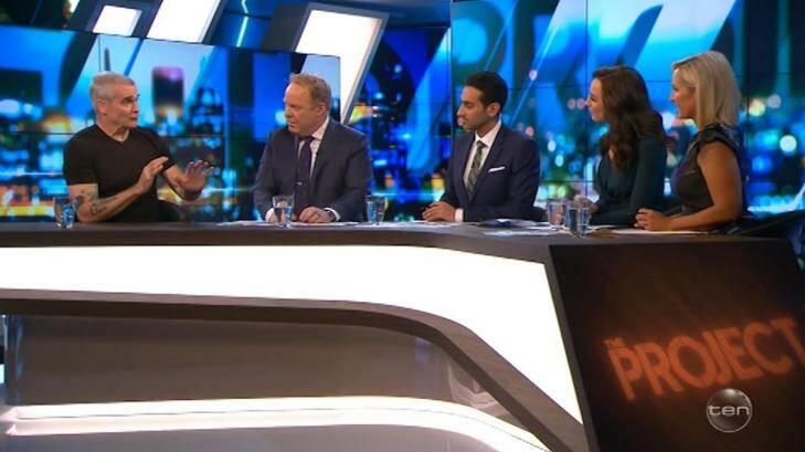 American performer Henry Rollins, left, speaks to The Project's hosts Peter Helliar, Waleed Aly, Carrie Bickmore and Fifi Box. Photo: Screenshot, Channel Ten