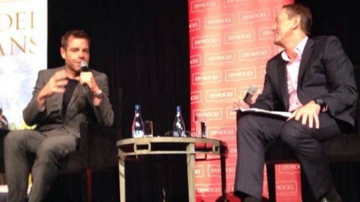 Cadel Evans with host Garry Maddox launches <i>The Art of Cycling</i> at a Dymocks Literary Club event in Sydney this week.  Photo: Kip Maddox