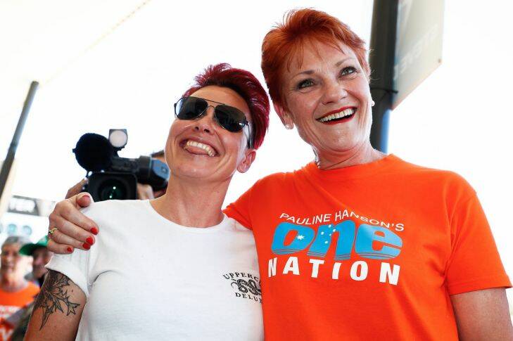 One Nation leader Senator Pauline Hanson meets with people at a polling booth in Buderim during the Queensland state election on Friday 24 November 2017. fedpol Photo: Alex Ellinghausen