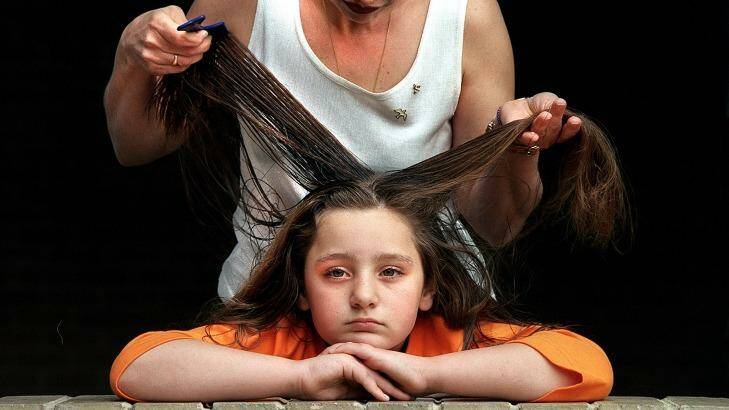 Parents will now have to comb through their kids' hair to get rid of lice because the pests have become immune to common insecticides. Photo: Joe Armao