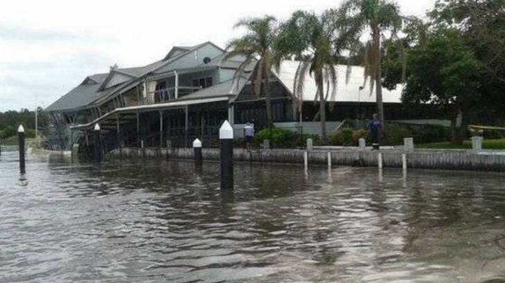 Restaurant Milanos On The Lake has partially collapsed into Lake Macquarie. Photo: Fire & Rescue NSW