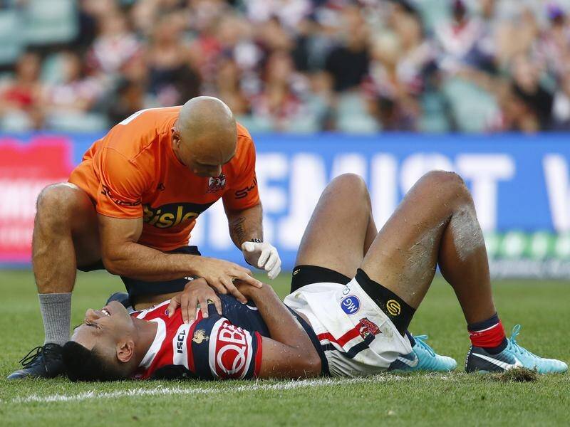 Roosters' Daniel Tupou is suspected to have torn a pectoral muscle while pressuring Kieran Foran.