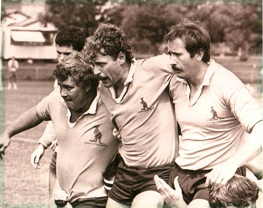 SADLY DEPARTED: Peter Aird (right) packing down in a scrum during his playing days with the Kangaroos.