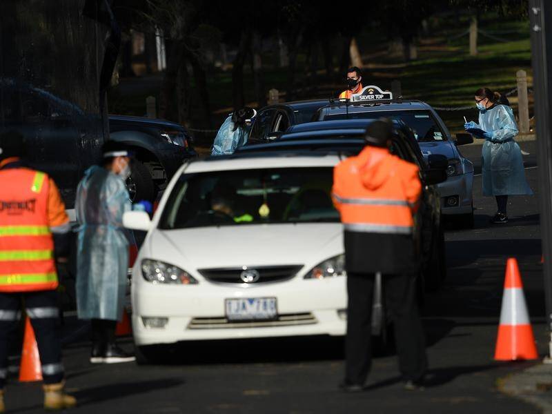 Healthcare workers at a drive-through COVID19 testing facility in Melbourne.
