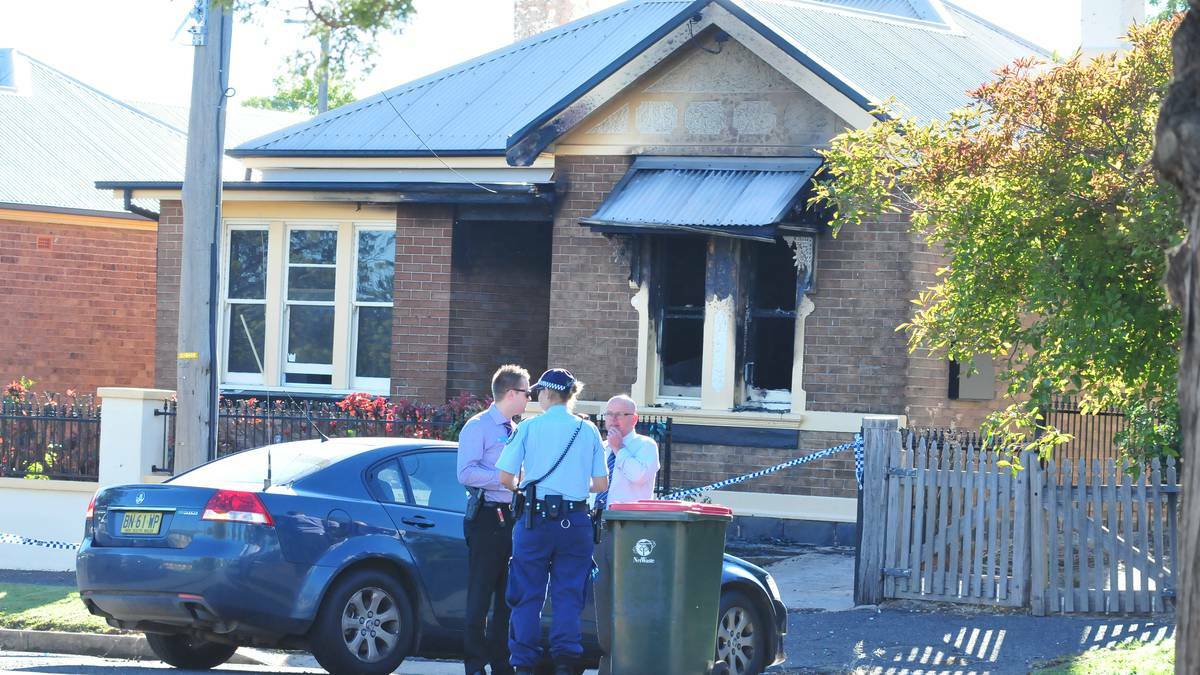 ORANGE: Forensic police spent Wednesday examining the scene of a house fire in Clinton Street after initial investigations determined the fire may have been deliberately lit.