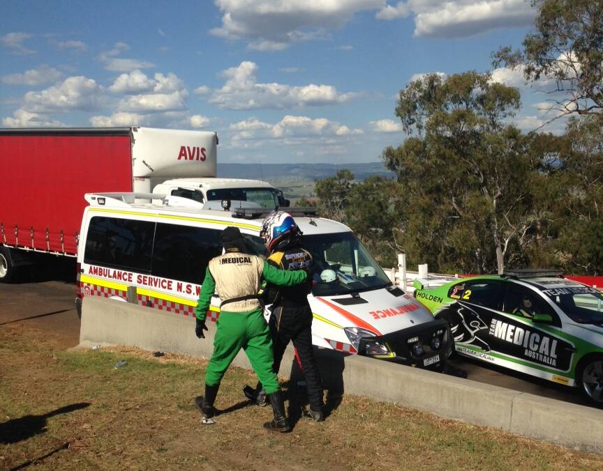 Tim Slade walks away from his accident. Photo: PHOEBE NEWLING