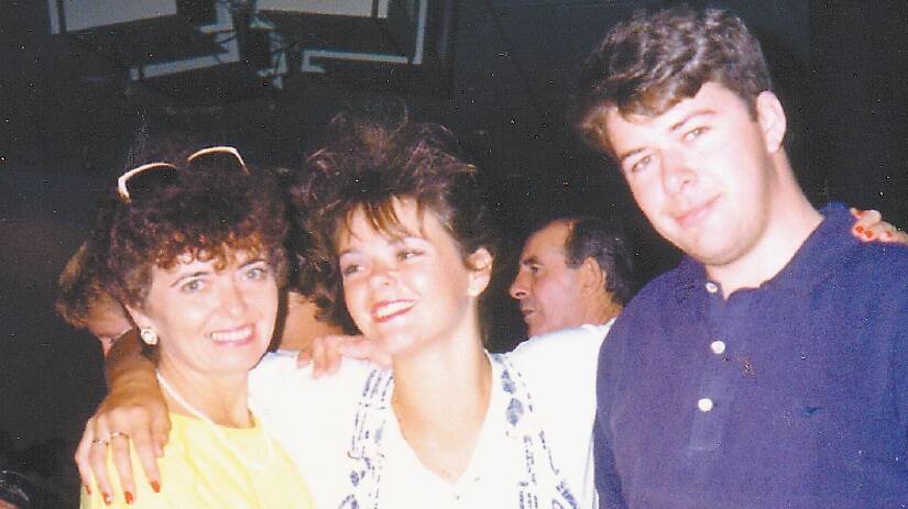 A young Troy Buswell, right, with his mother Margaret Osborne and sister Kellie.
