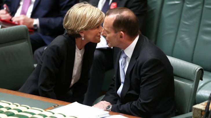Foreign Minister Julie Bishop talks strategy with Prime Minister Tony Abbott in Parliament House. Photo: Alex Ellinghausen