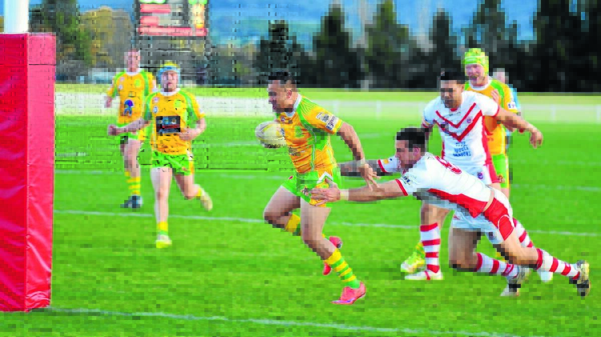 GUTTING LOSS: CYMS five-eighth Matt Rose goes in for his try, but the green and golds still lost to Mudgee on Saturday. 
BRYSON FERREIRA
