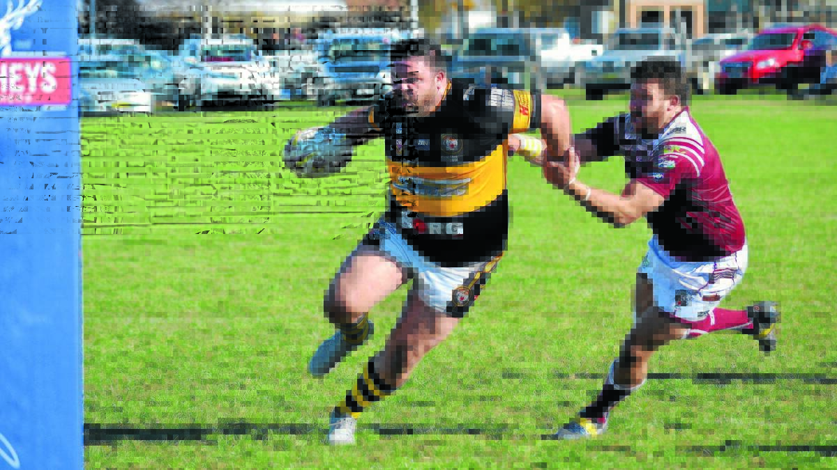 ROSE OUT: George Rose makes a run for the Oberon Tigers against Blayney. Suspension will prevent him from doing so at Wade Park in two weeks’ time.                            2216agoberon1