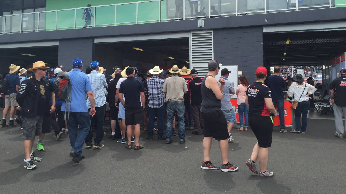 Great to see a large number of fans out the back of the Wild card #200 Renee Gracie and Simona De Silvestro garage. The girls are back on track. Photo: NADINE MORTON. 