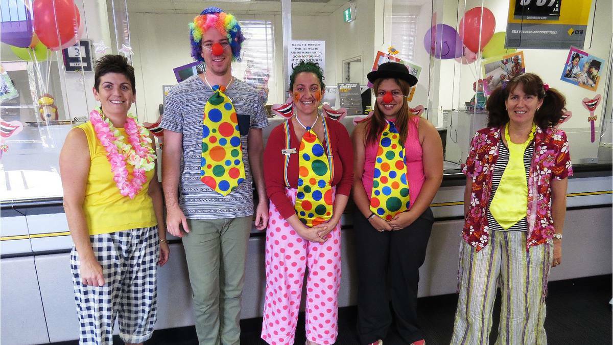 Leanne Hunt, Mitch Hubble, branch manager Clara Watson, Tanaya Davis and Michelle Nancarrow from Northam Commonwealth Bank suit up for the Clown Doctors. Photo: Avon Valley Advocate.