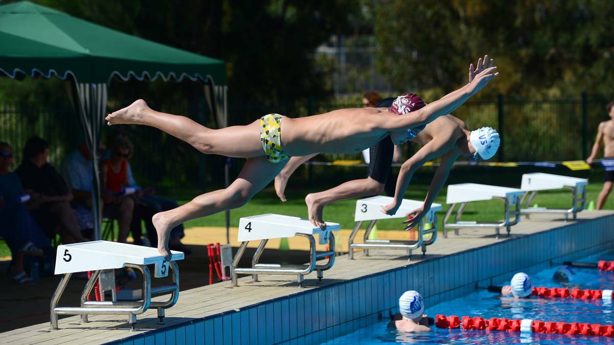 Bendigo V Ballarat swimming Showdown. Mitchell Sherlock, Bendigo leaps off the blocks in the 13years 100m freestyle. Picture: JIM ALDERSEY/ Bendigo Advertiser