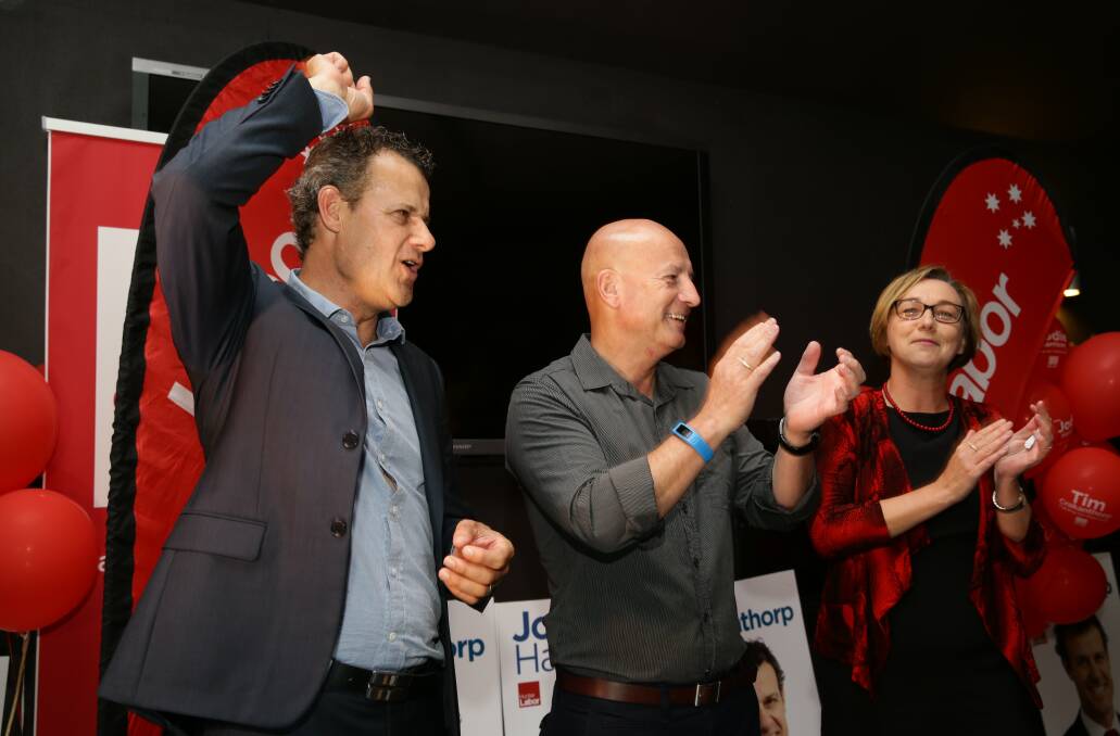 Labor's winning team: From left, Tim Crakanthorp, John Robertson and Jodie Harrison. Picture: Jonathan Carroll