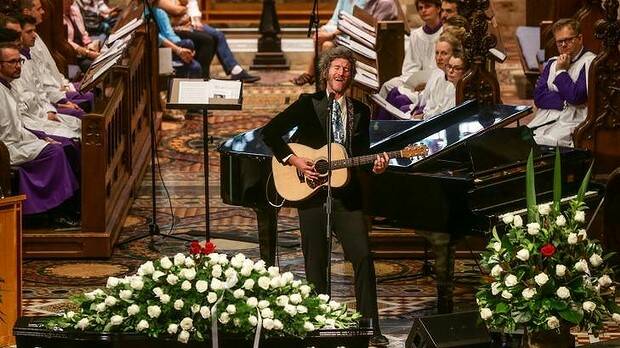 Tim Rogers of You Am I performs at the funeral service for Stevie Wright at St Andrew's Cathedral in Sydney. 8th January 2016. Photo: Dallas Kilponen
