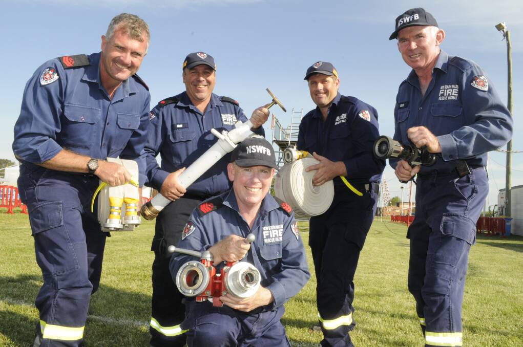 KINGS AGAIN? Kelso firefighters Ray Dresser, deputy captain Shane Kearney, Lance McKenzie, captain Graham Gibbons and (front) Russell Deans are back to defend their crown in the Fire and Rescue NSW State Championships that will kick off in Bathurst on Thursday. Photo: CHRIS SEABROOK 102014champs