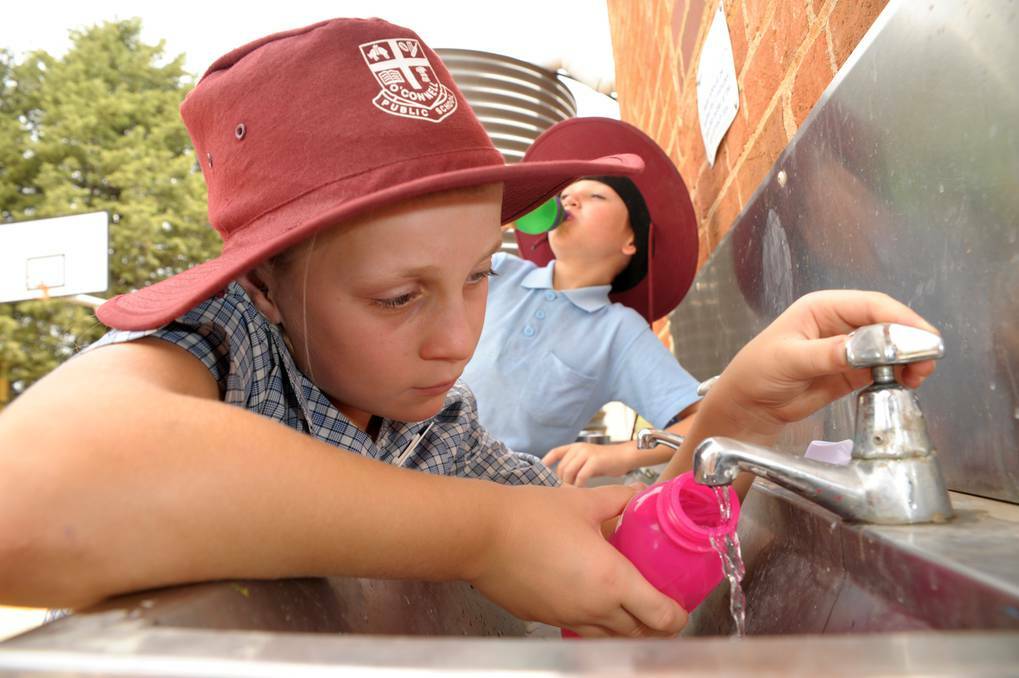 BATHURST: Drought is causing heartache for farmers across the region, but spare a thought too for the little village schools which are also being affected by months without rain.  O’Connell Public School students Stella Gavey and Billy Rudd fill up their water bottles.