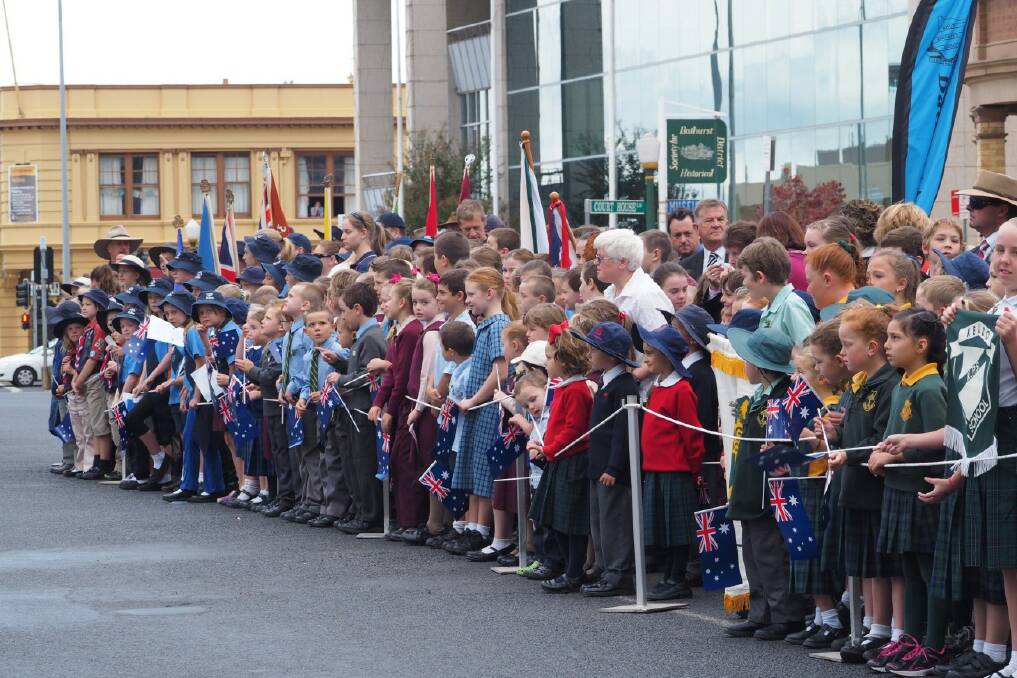 ANZAC DAY: The march wended its way through the large crowd lining Russell Street on Friday. Bathurst's main Anzac Day commemoration service was then held at the War Memorial Carillon in front of thousands of people who came to pay their respects. PHOTOS: Zenio Lapka. 