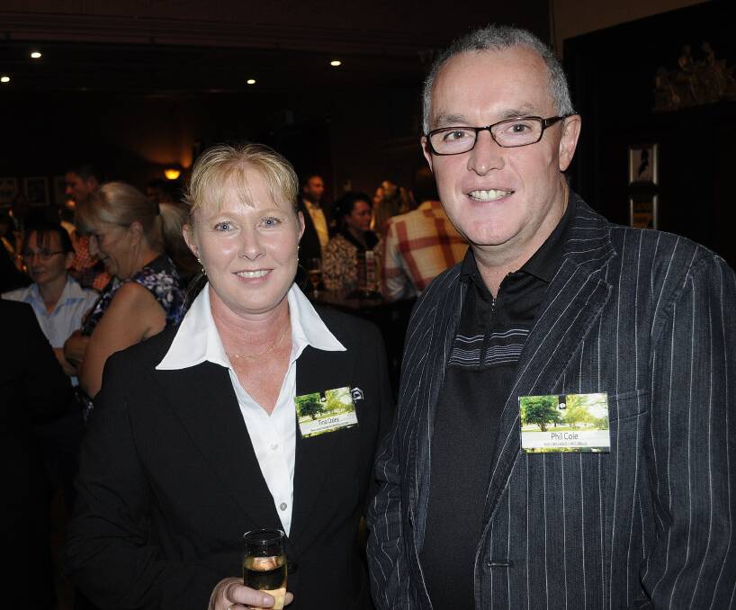 SNAPPED: Newcastle Permanent launch in Bathurst. Tina Oxley with Phil Cole from 2BS. 040214cncastle3