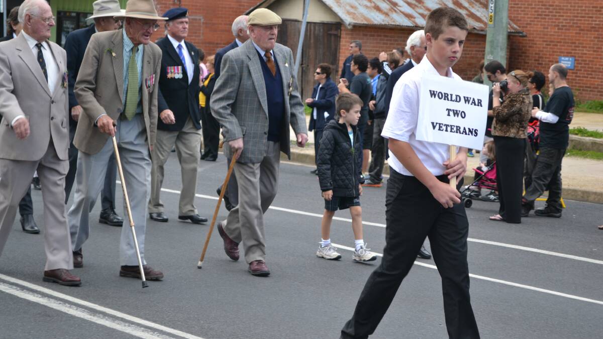 ANZAC DAY: The march wended its way through the large crowd lining Russell Street on Friday. Bathurst's main Anzac Day commemoration service was then held at the War Memorial Carillon in front of thousands of people who came to pay their respects. PHOTOS: Brian Wood.