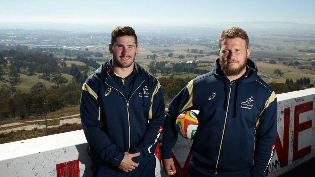2014: Wallabies duo Nathan Charles (left) and James Slipper pose during a media session at Mount Panorama last year. 