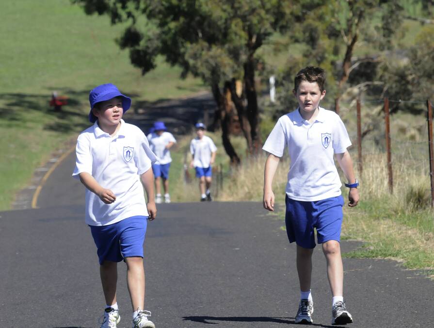 WALK OF LIFE: Some walked, some ran, but all the students who competed in the Cathedral School’s cross country at Sulman Park, Mount Panorama had a great day outdoors enjoying the autumn weather. Photo: CHRIS SEABROOK 031114cath10