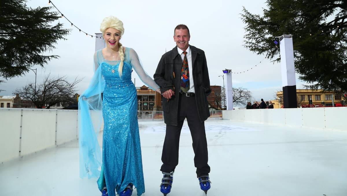WELCOME: Western Advocate chief of staff Brian Wood welcomes Elsa to the Kings Parade ice rink. Photo: PHIL BLATCH