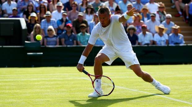 Wimbledon farewell: Lleyton Hewitt of Australia bows out against Jarkko Nieminen of Finland. Photo: Getty Images