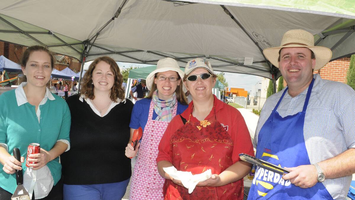 SNAPPED: St Michael and St John’s Cathedral community fete. Cathedral Parish Young Adults Group members Camilla Sadgrove, Madeline Beck, Rachel Lonard, Peta Leseberg and Josh Clayton.