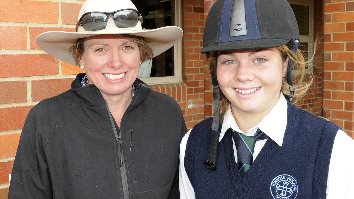 SNAPPED: Stannies’ Autumn Fair and Open Day. Robyn and Laura Hardie loved the showjumping.